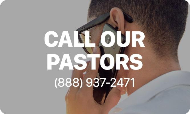 a person on a cell phone with the text 'call our pastors (888) 937-2471' at center