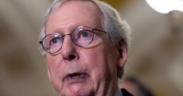 Mitch McConnell's face wearing glasses