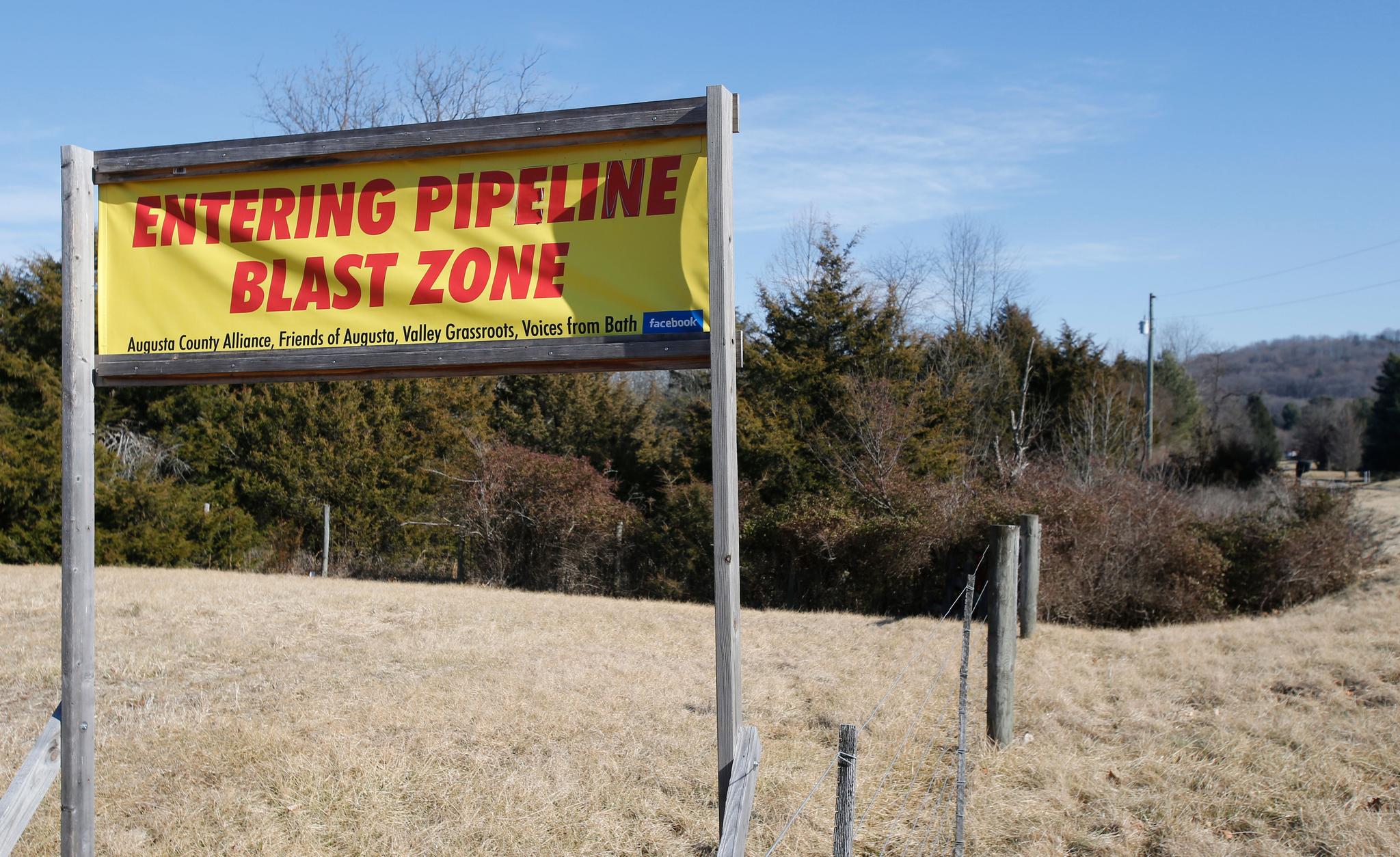 a sign marking the path of the Atlantic Coast Pipeline