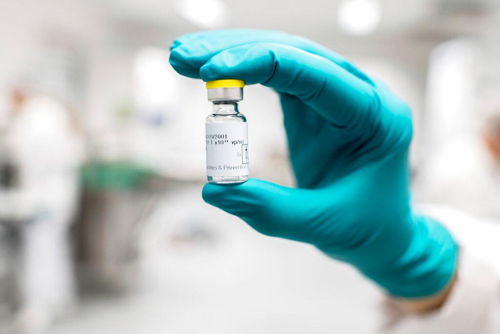 Person holding vial of the Janssen COVID-19 vaccine