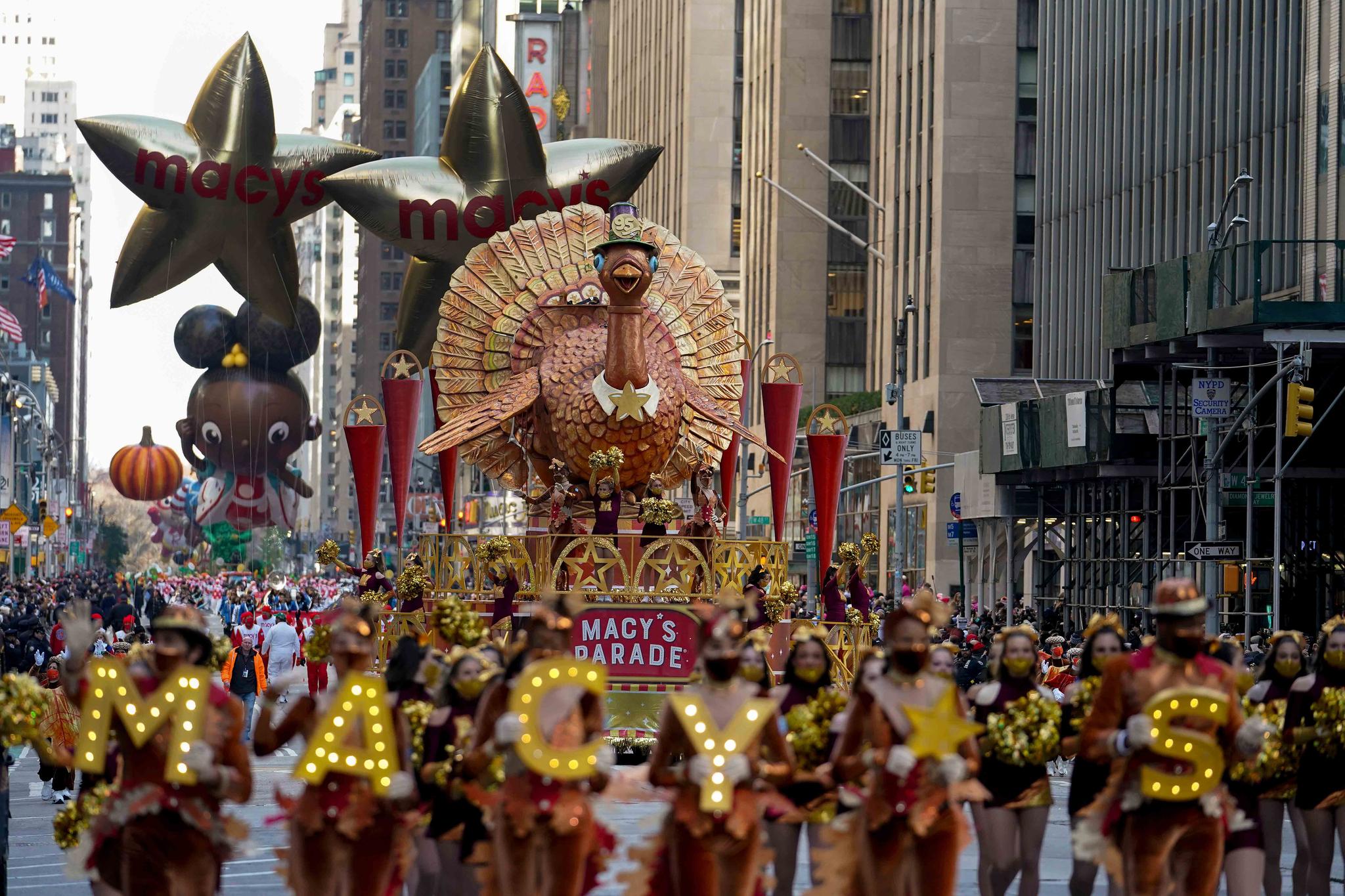 The Tom Turkey float moves down Sixth Avenue during the Macy's Thanksgiving Day Parade in New York, Thursday, Nov. 25, 2021.