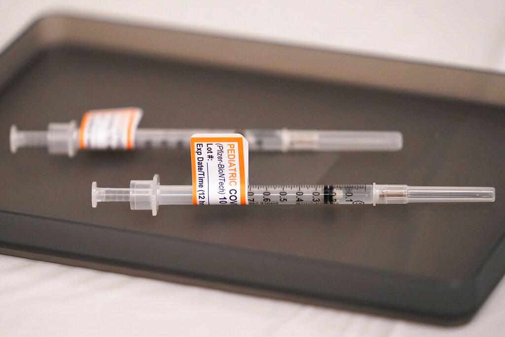 2 syringes on display