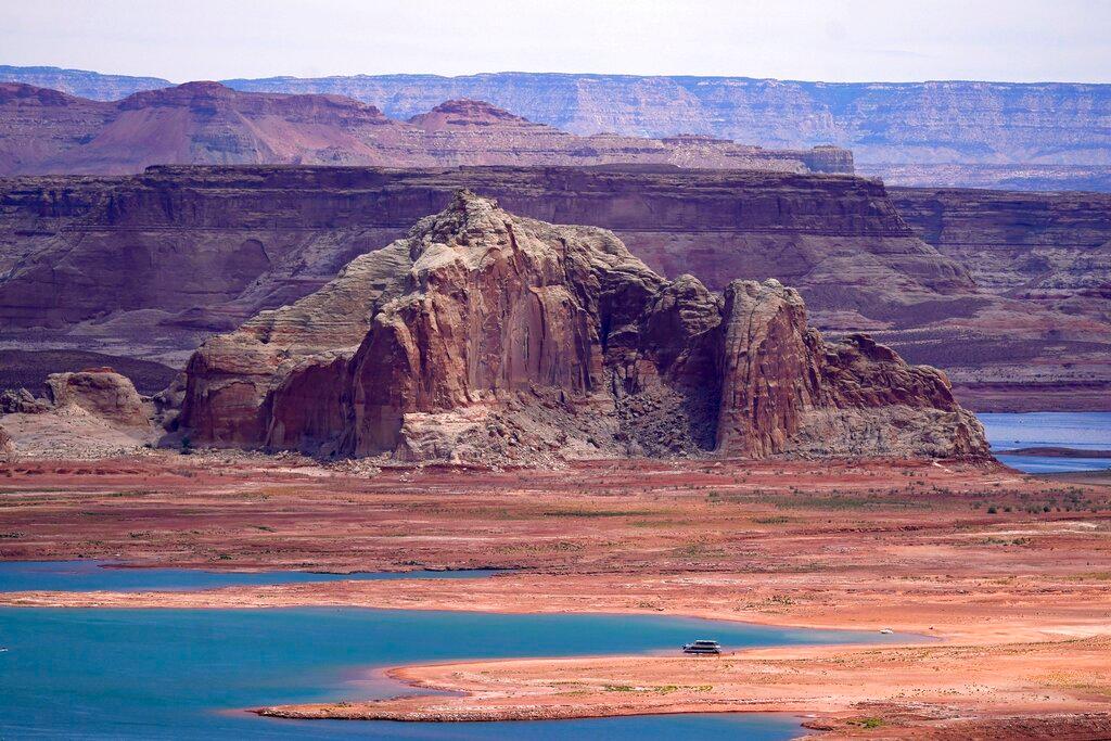 Low water levels at Wahweap Bay at Lake Powell along the Upper Colorado River Basin are shown, June 9, 2021, at the Utah and Arizona border at Wahweap, Ariz. The Biden administration announced Thursday, Feb. 2, 2023, that 15 Native American tribes will get a total of $580 million in federal money this year for water rights settlements.